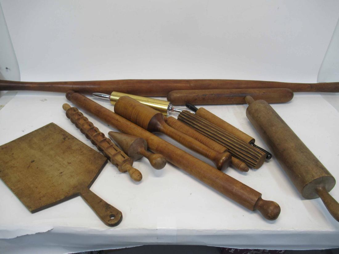 Eleven Wood Rolling Pins: Together with a wood cutting board. 12 pieces Longest: 5'l