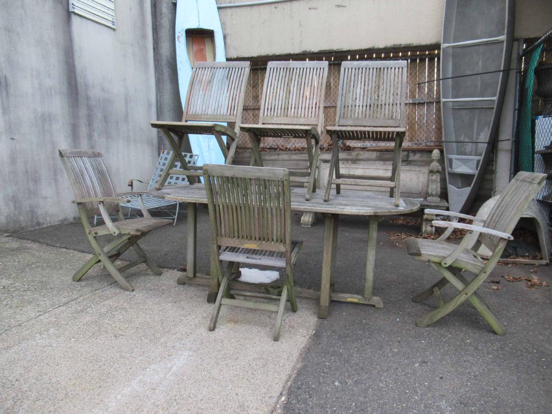 Kingsley-Bate Teakwood Patio Set: 6 chairs together with matching table.