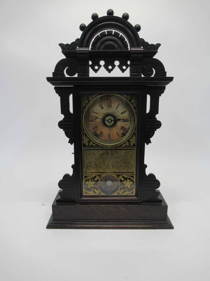 Seth Thomas Mantle Clock: With gilt decorated door. 16" wide x 25" tall