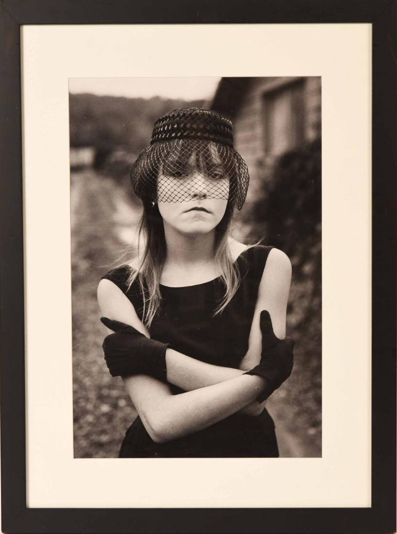 Gelatin Silver Print, Streetwise, Mary Ellen Mark: (American, b. 1940), Tiny in Her Halloween Costume "Streetwise," Seattle, Washington, 1983, printed later, probably signed, dated and numbered from an edition of 25 in graphite to verso. Sight size: 1