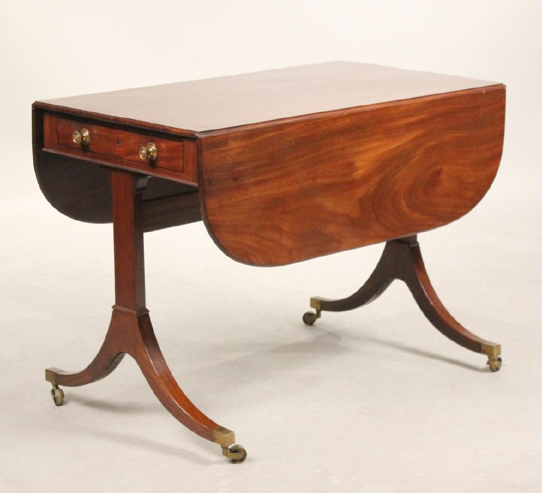 Regency Mahogany Elongated Drop Leaf Table: English, c. 1810. 27-1/4"h x 38"w x 22"d