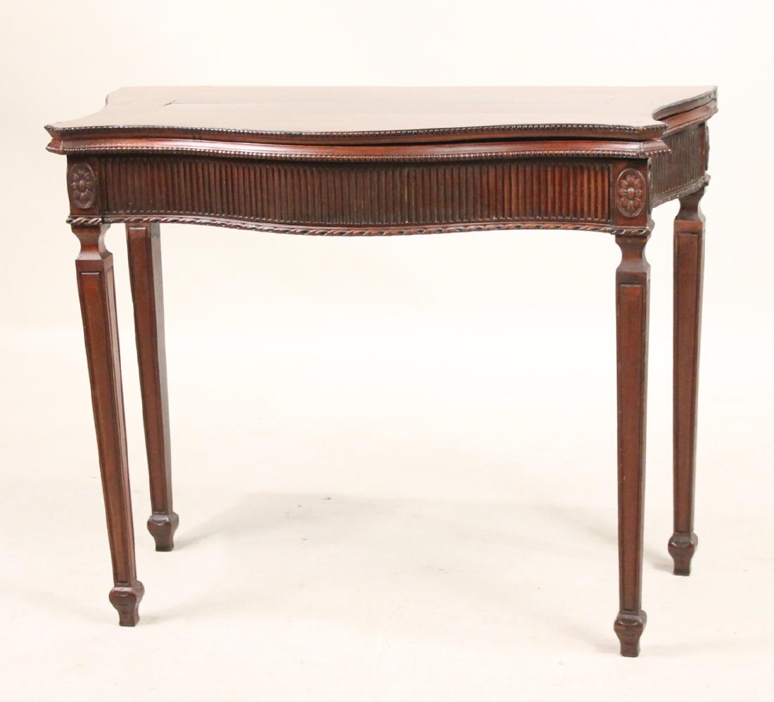 George III Mahogany Serpentine Front Game Table: English, c. 1775, with fluting, beading and rosettes, with secret drawer, manner of Thomas Chippendale Jr. 28-3/4"h x 25-1/2"w x 17-3/4"d
