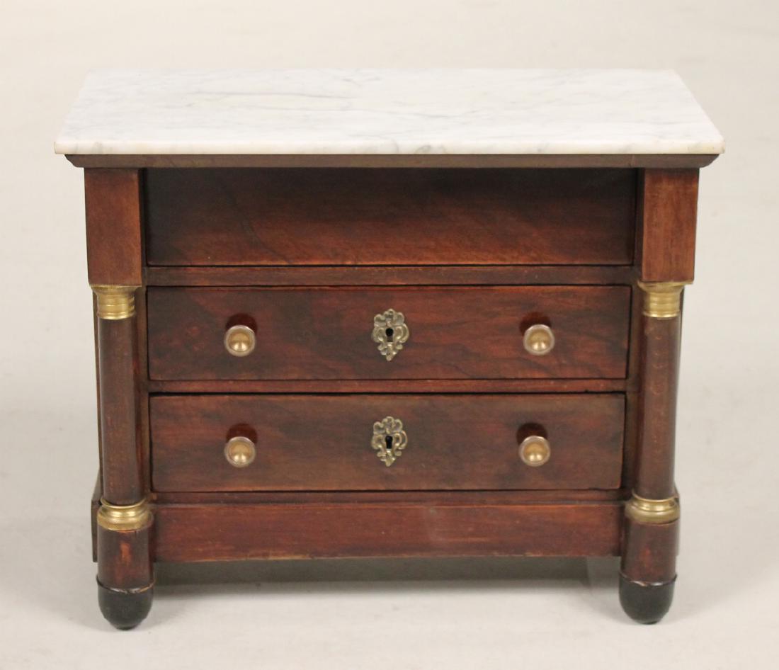 Empire Marble Top Mahogany Miniature Commode: Continental, c. 1840, with side columns. 15-1/2"h x 19"w x 9-3/4"d