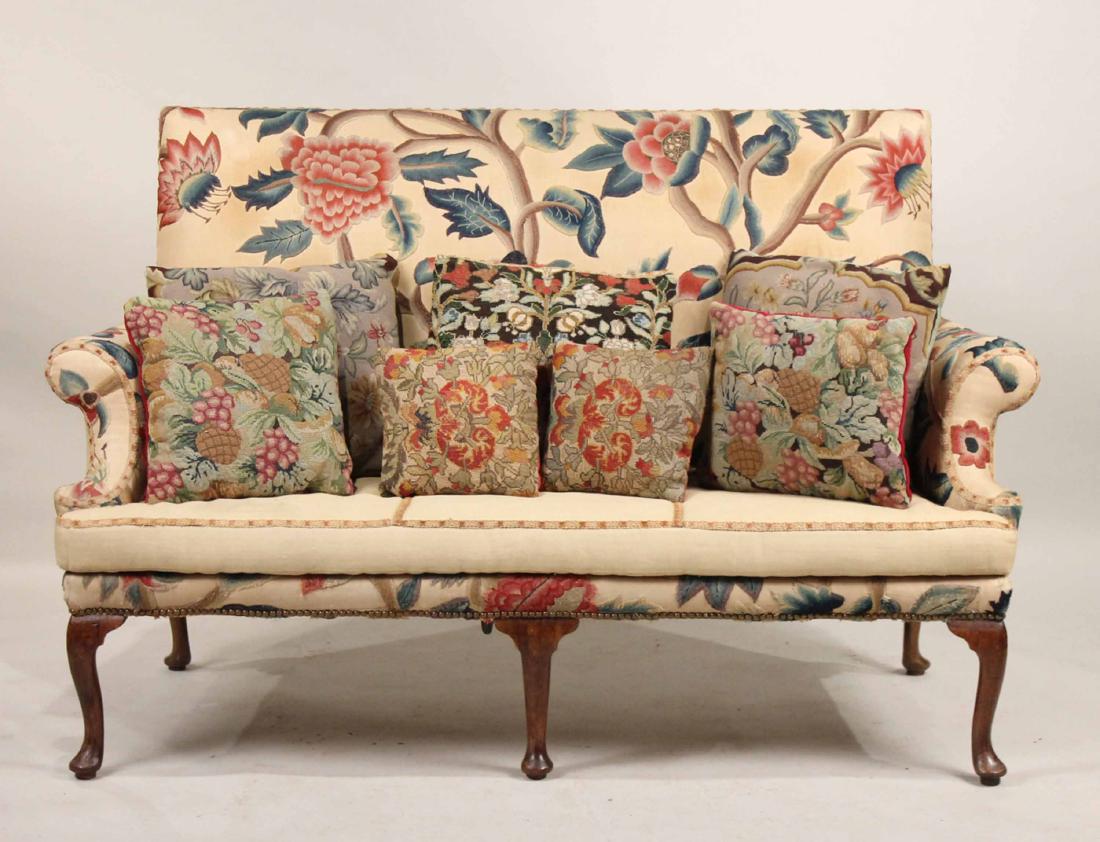 Queen Anne Walnut Cabriole Leg Settee: English, c. 1710-1720, covered in rare 19th century crewelwork. 42"h x 5'6"w x 30"d