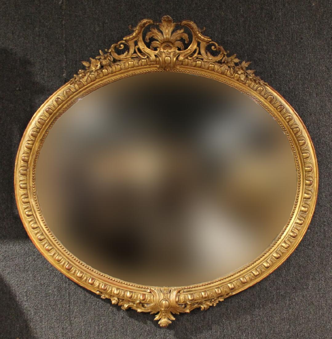 Neoclassical Style Oval Giltwood Mirror: 20th C., of impressive size. 4'5"h x 4'5"w