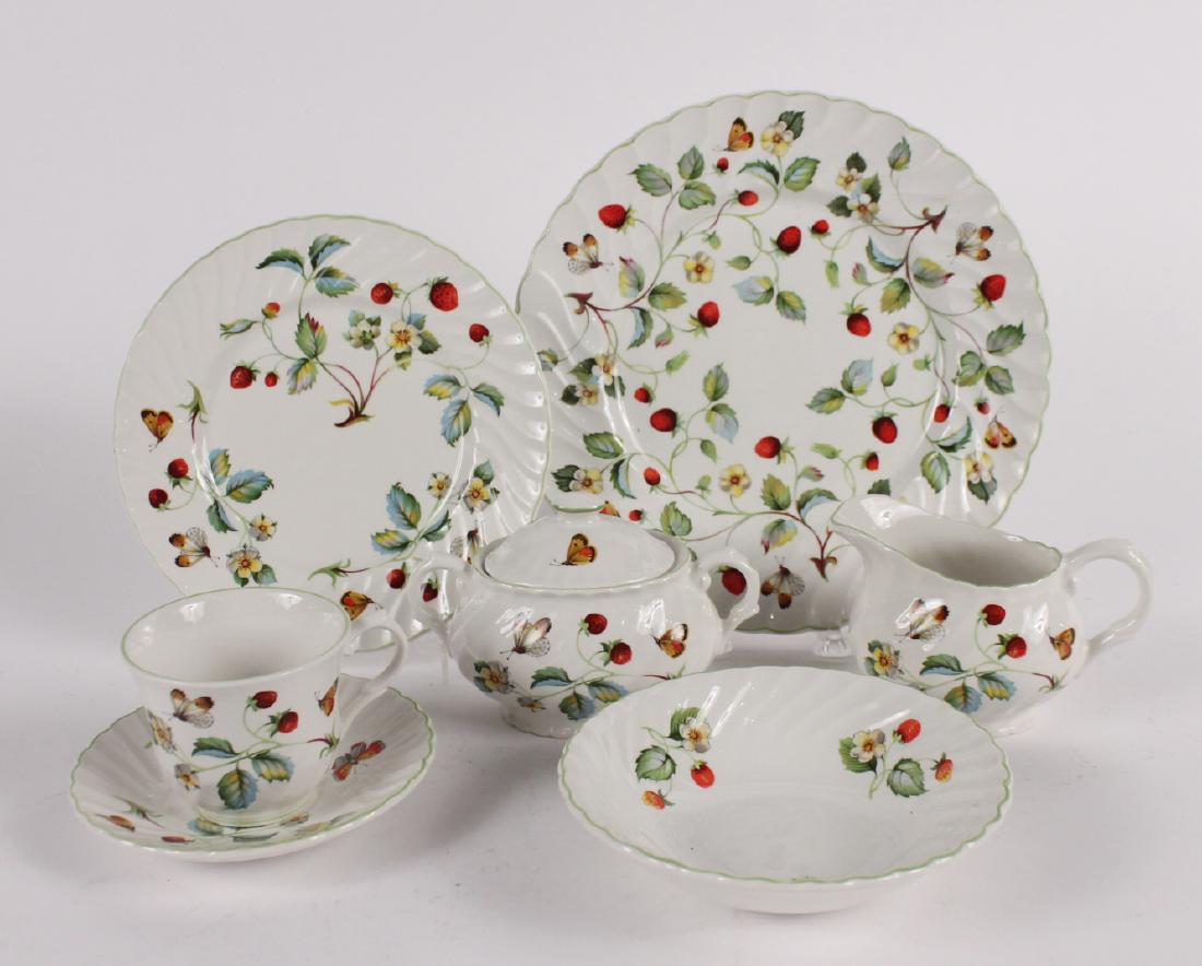 James Kent Porcelain Dinner Service: English. Comprising 8 dinner plates, 8 luncheon plates, 8 fruit bowls, 10 cups and 11 saucers, creamer jug and covered sugar bowl.