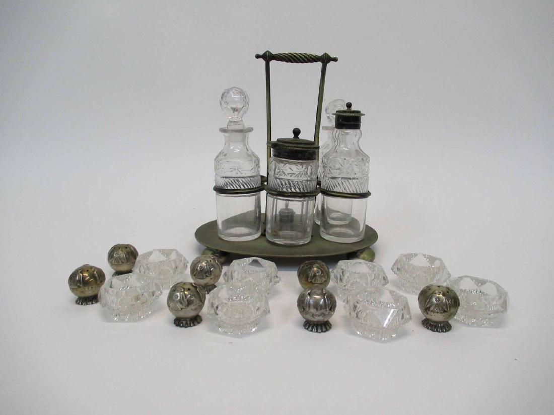 7 Silver Plated Salt & Pepper Shakers: Having Thunder Bird decoration. Together with 8 Glass Salt Cellars and partial Cruet set.