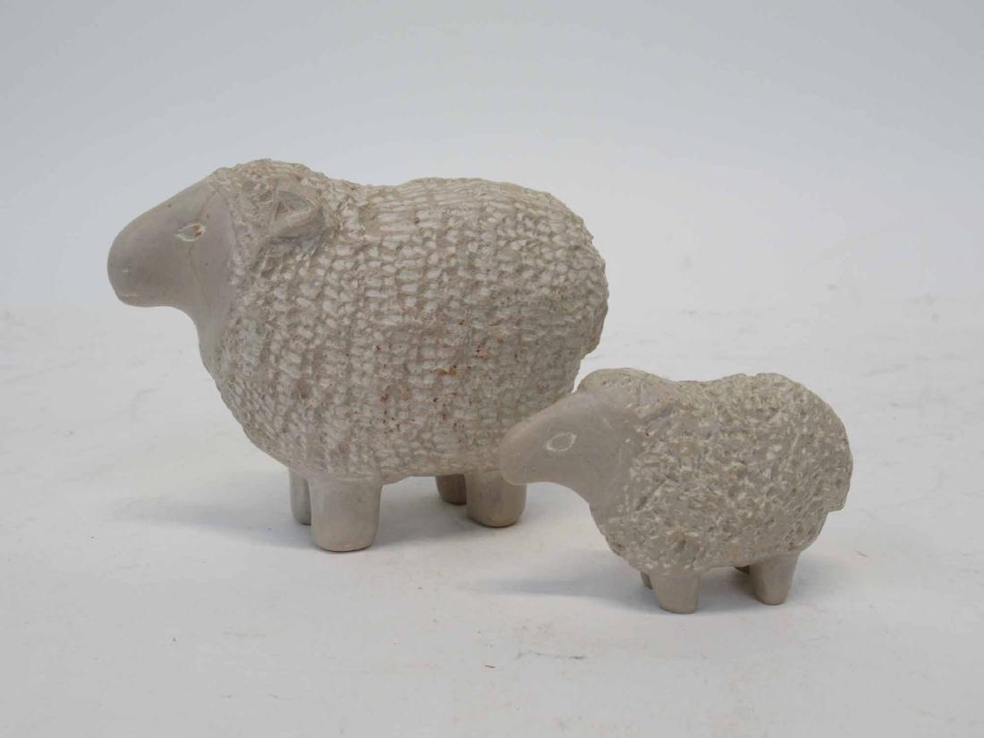 Pair of Ceramic Sheep: Graduated in size. 2"h, 3-1/2"h.
