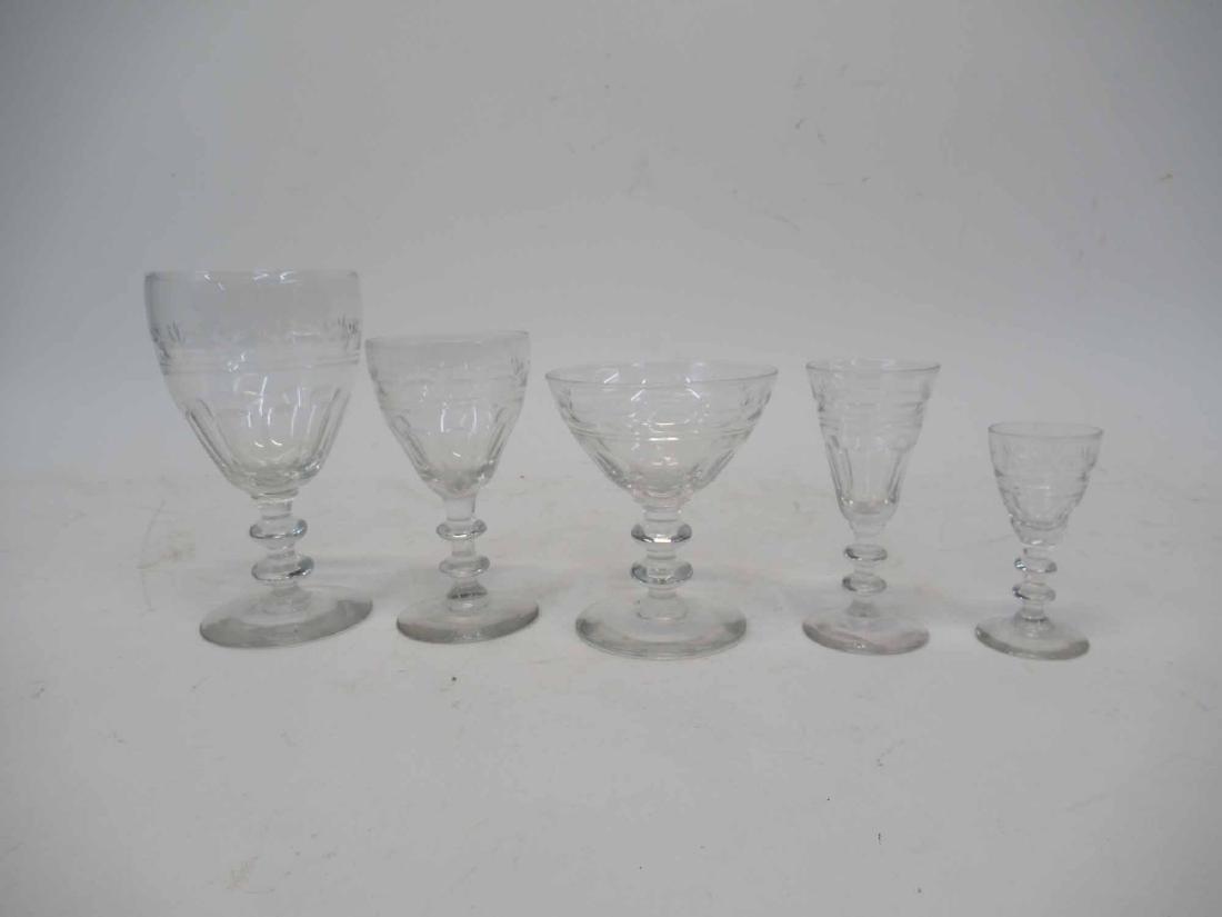 Large Set of Pattern Glass Stemware: Comprising 12 water goblets, 12 champagne saucers, 14 wine glasses, 12 sherry glasses & 6 cordials. Water goblets, 6-1/4"h.