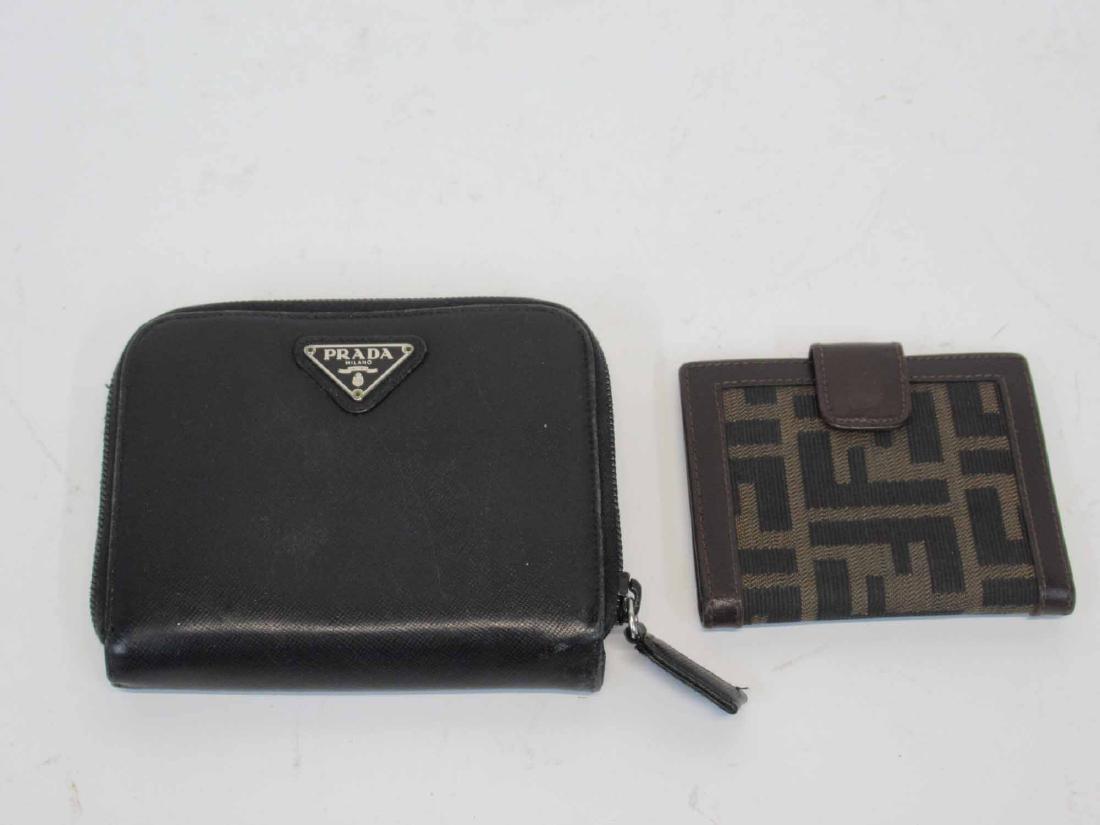 Prada Black Leather Wallet: Italy. Together with a Fendi Monogram and brown leather credit card wallet. 5"h x 4"w