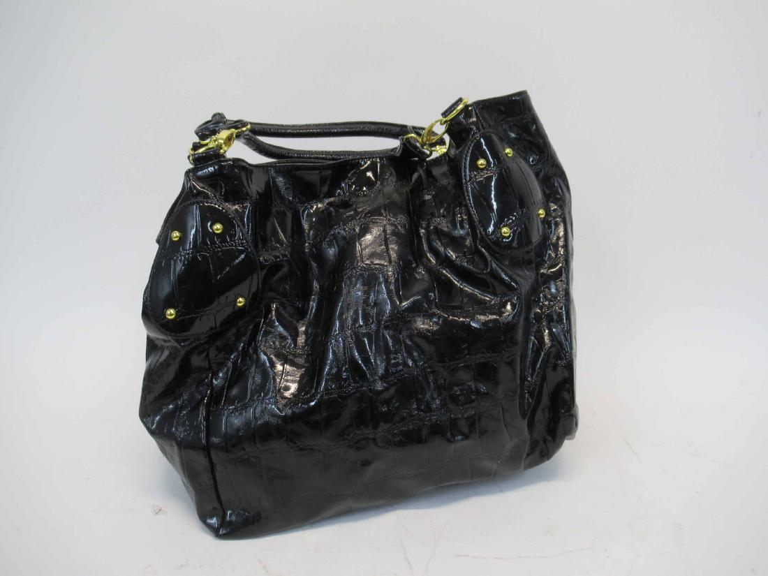 Big Buddha Black Crocodile Tote Bag: Coated canvas, gold tone hardware, double detachable rolled shoulder straps, interior lined in black nylon with one long zippered compartment, and two slip pockets. 13"h x 20"w x 9-1/2"d, handles 8-1/