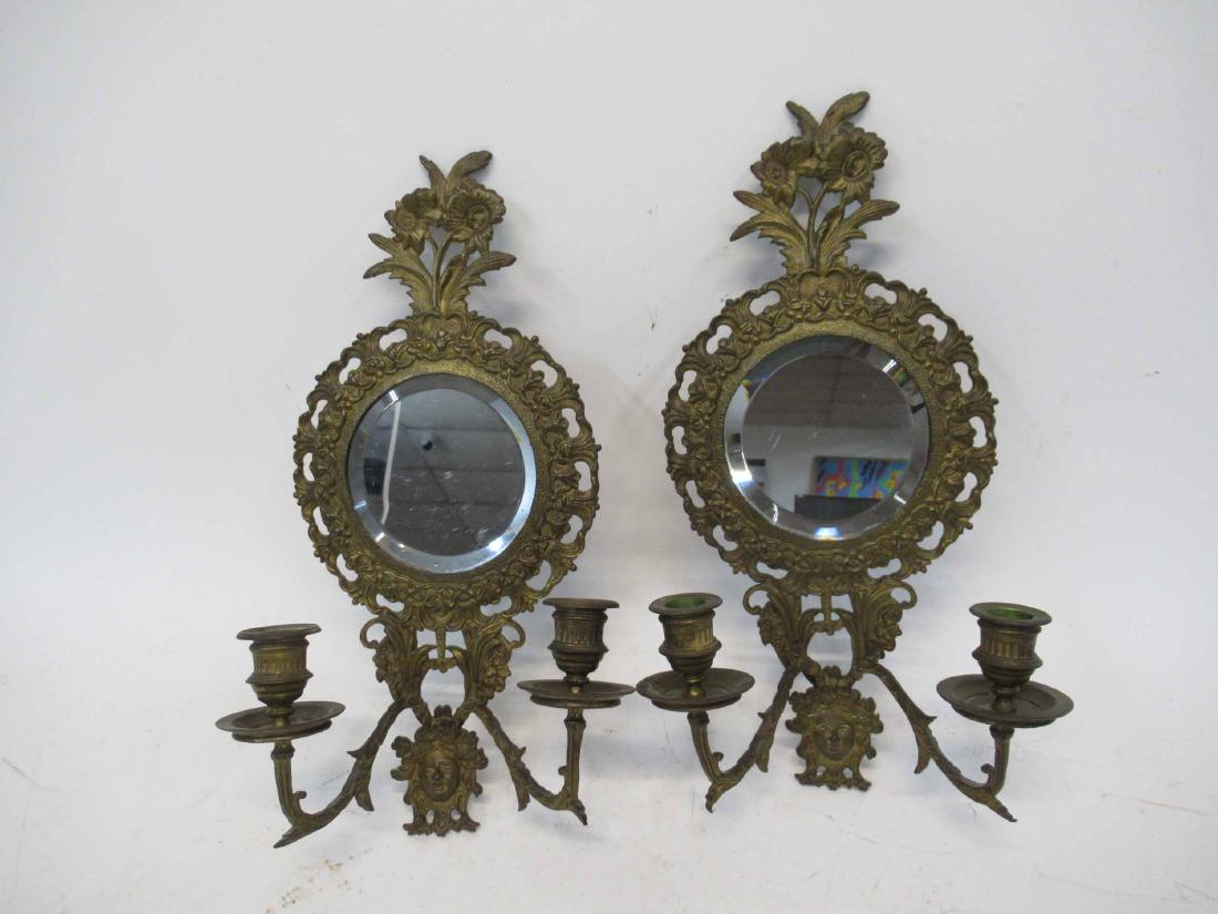 Pair of Brass Mirrored Wall Sconces: Having two lights with central beveled glass mirror. 16 3/4" tall x 8" wide x 4 " deep