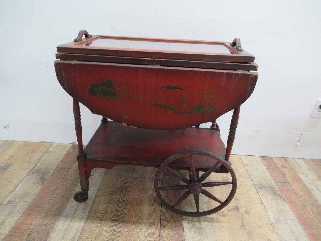 Red Painted Tea Cart: Having glass tray top with fold down sides. Surface distress.