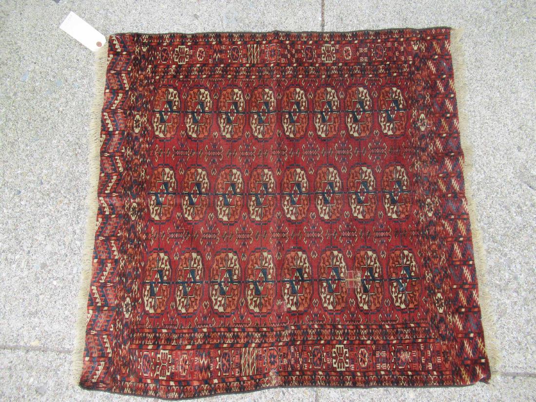 Bokhara Throw Rug: Bukara. Used condition, tears and repairs, wear, worn. 3' 4" x 3'4"