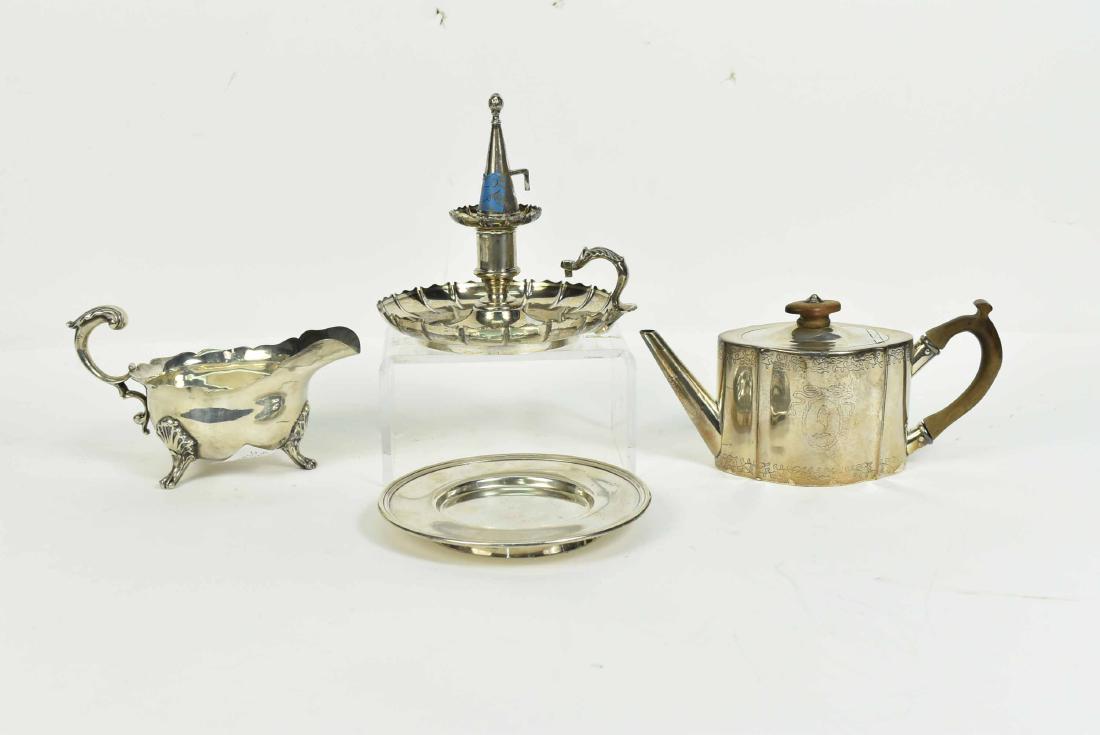 J. Wagner & Sons Sterling Silver Gravy Boat: #2330, weight approx. 10 T.O., 7-1/4"l. Together with a Russian silver ring footed plate, weight, approx. 8 T.O., 6"d. Mathew Boulton silver over copper chamber stick, 5-1/4"d., and silver plated drum