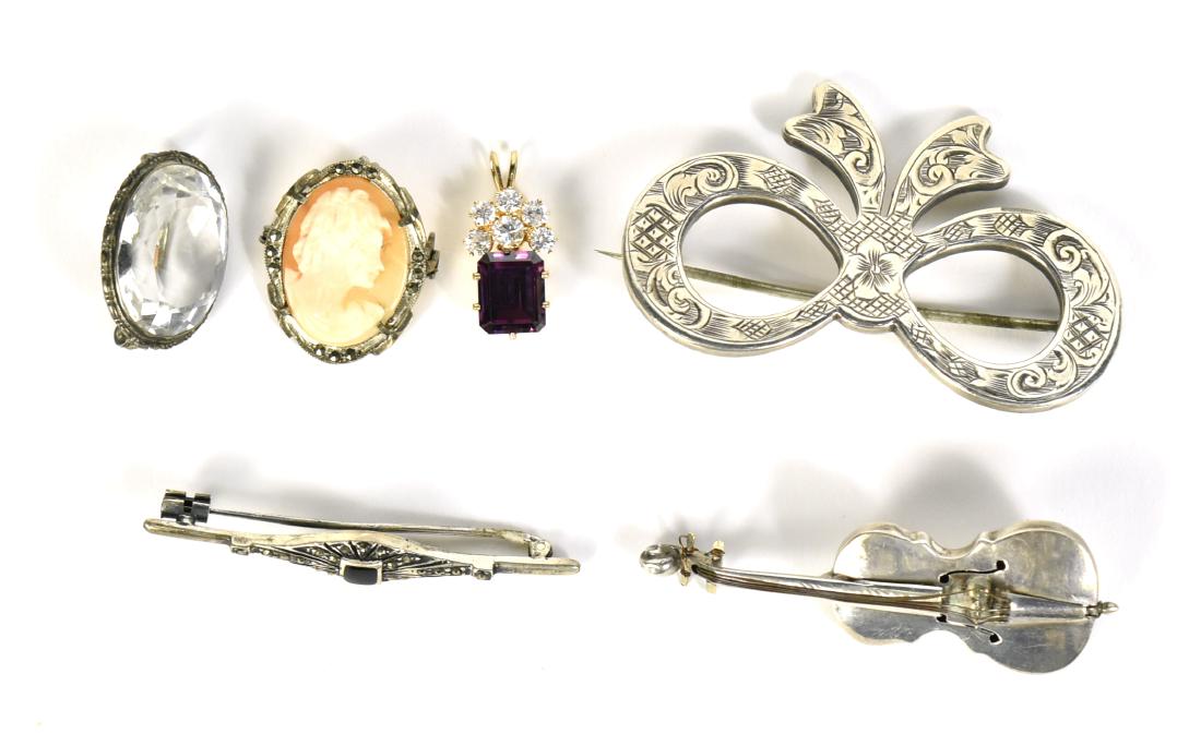 Group of Five Silver Pins: Comprising engraved bow brooch, 1-1/2"h x 2-1/2"w, marcasite bar brooch stamped 925, 2"l, carved shell cameo within silvered metal with bail as a pendant, 1"l x 3/4"w, Mexican silver violin, 2-1/4"l, 