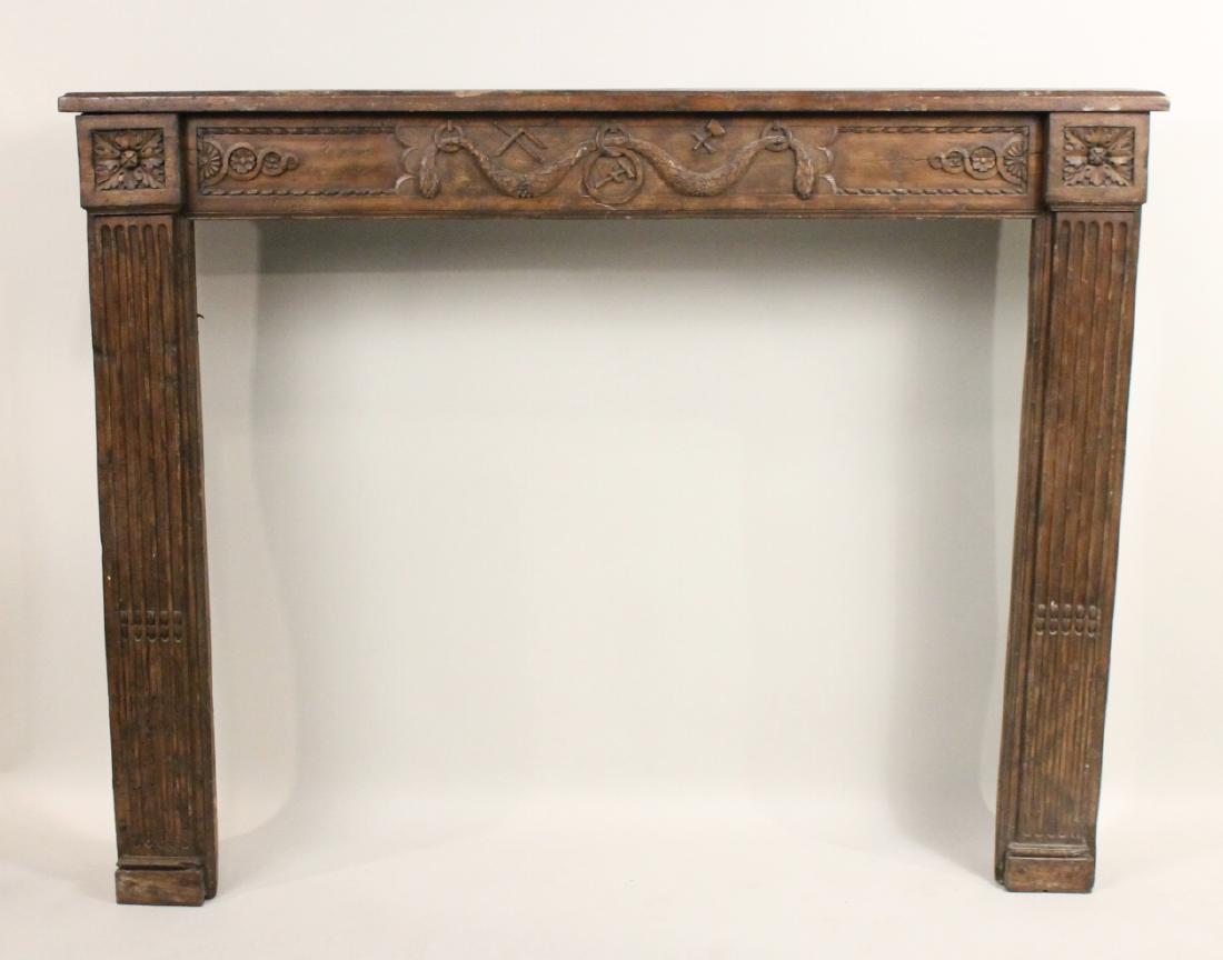 Louis XVI Provincial Carved Oak Mantel: French, c. 1790. Scratches, dents, and cracks. 48-1/2"h x 5'3"w x 8-1/4"d