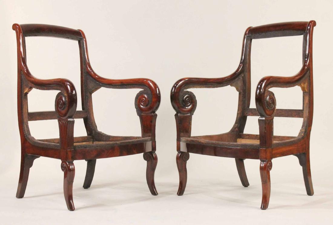 Pair of Empire Mahogany Bergeres: French, c. 1825. Lacking upholstery. 36-1/4"h x 24"w, over arms.