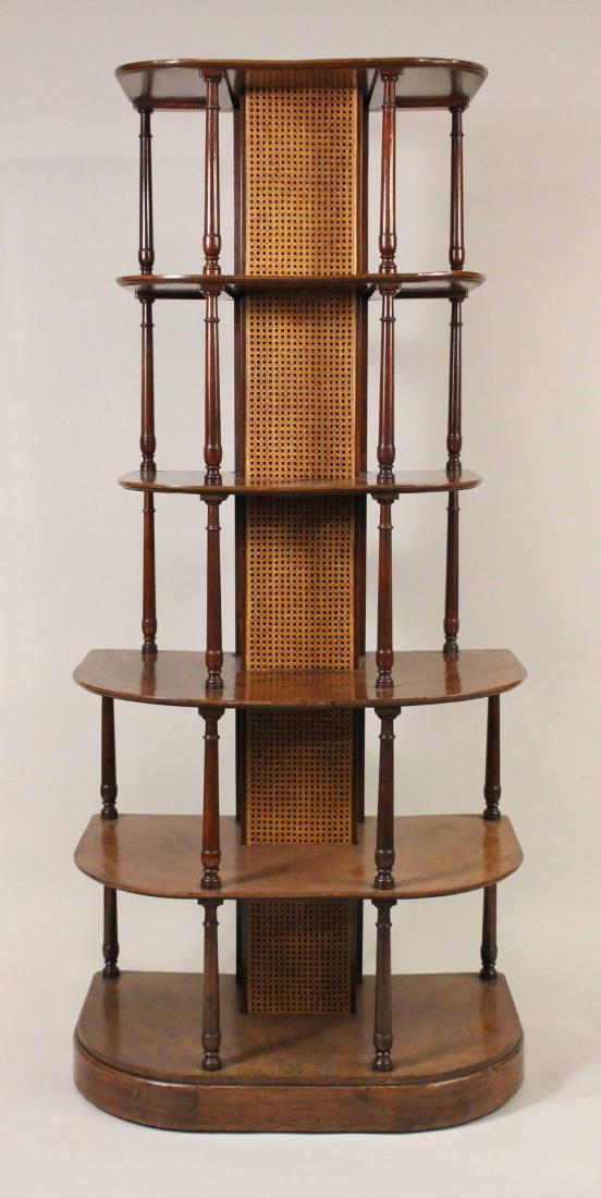 Regency Mahogany Graduated Etagere: English, c. 1820, with caned center section. 6'10"h x 38"w x 23-1/2"d