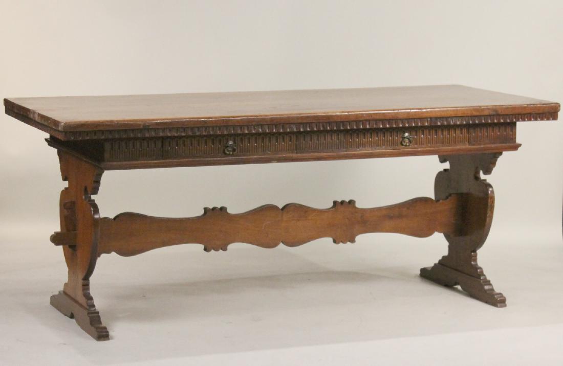 Renaissance Walnut Trestle Base Library Table: Italian, c. 1660-1670. Worm damage, cracks, scuffs. 32"h x 31-1/2"w x 6'7"l