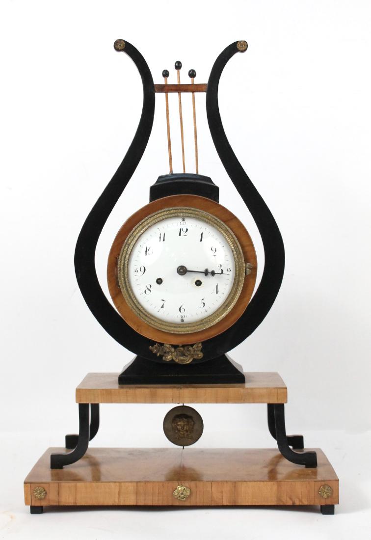 Biedermeier Part-Ebonized Cherrywood Mantle Clock: Austrian, First-Half 19th C., of lyre form. 22"h x 14"w x 7"d