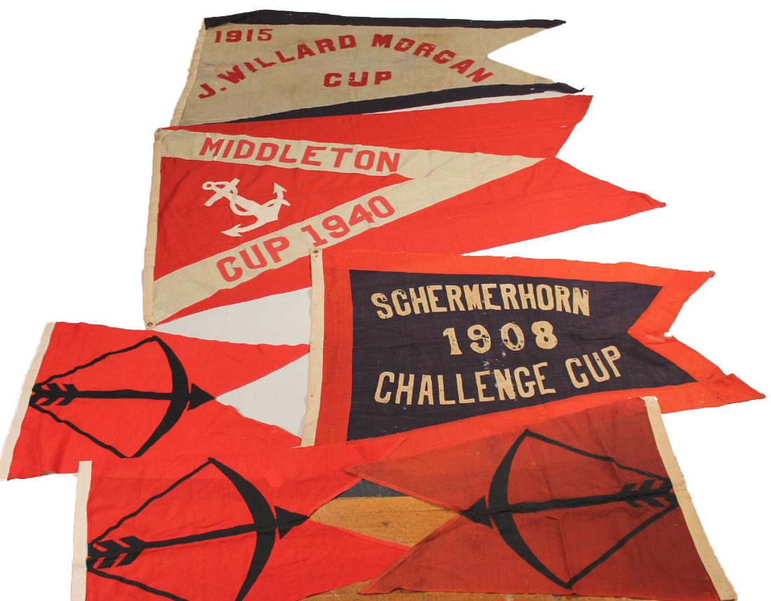 Group of Vintage Wool Regatta Flags: Barnegat Bay Yacht Racing Association flags including a 1908 Schermerhorn Challenge Cup, 1915 J Willard Morgan Cup, 1940 Middleton Cup. Together with three wool red and black swallowtail flags adorned