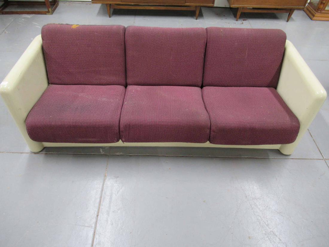 Crucible Furniture Co Fiberglass Sofa: Crucible Furniture Co Fiberglass Sofa upholstered seats and backrest. Used condition, wear, worn, scratches, surface distress, stained and torn upholstery. 26 1/2" tall x 75" long x 29" deep.