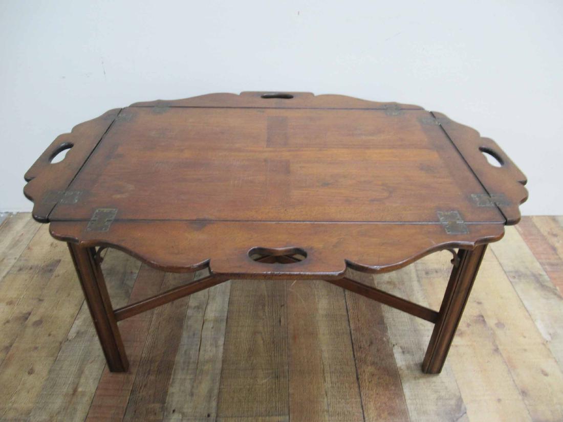 Mahogany Butlers Tray Table: Chippendale Style Mahogany Butlers Tray Table. Used condition, surface wear. 41" long x 30" wide x 18" tall