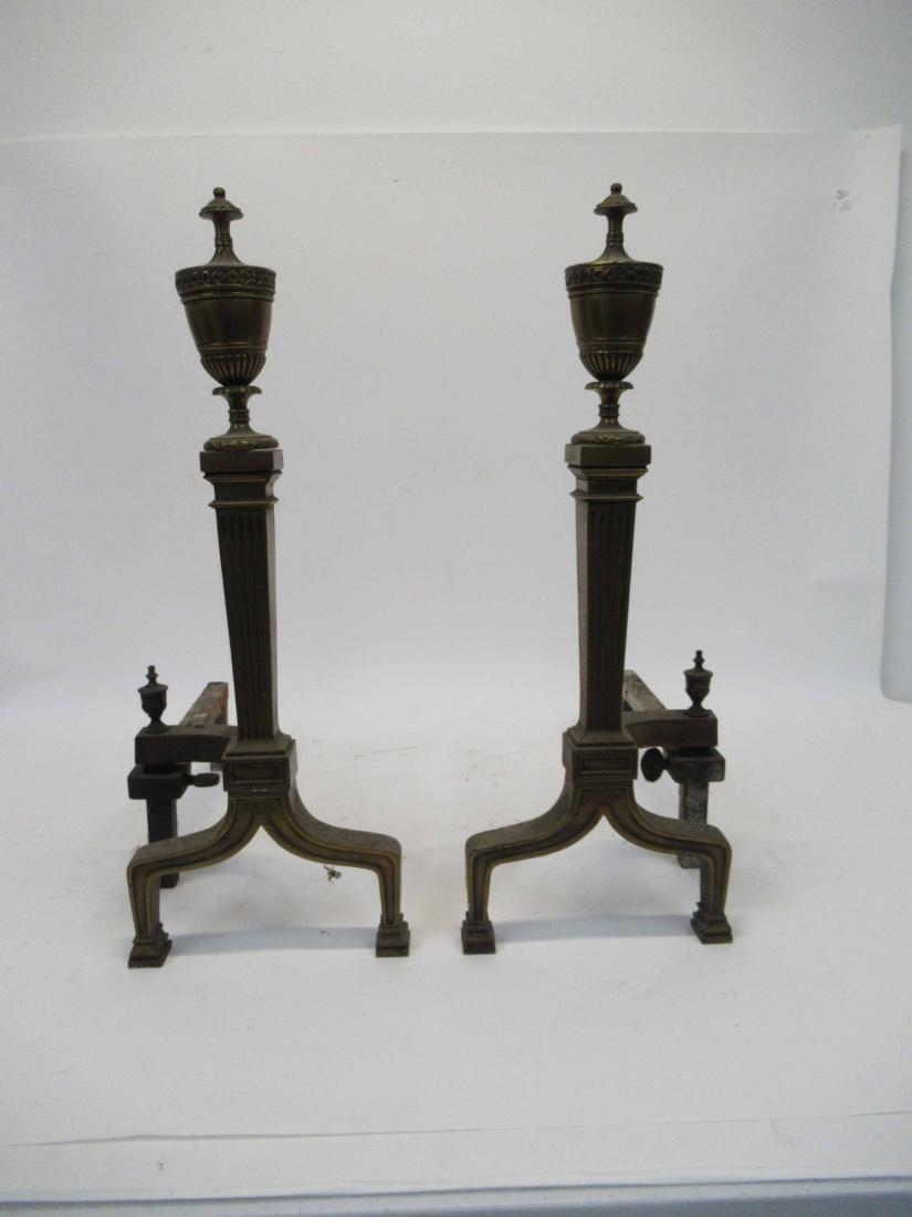 Pair of Brass Urn Form Andirons: Pair of Brass Urn Form Andirons. Used condition, wear, worn. 20" tall x 9" x 15".