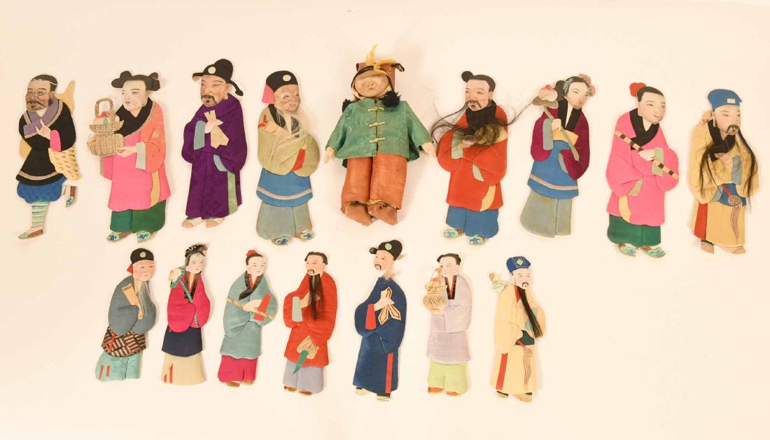 Chinese Quilted Silk and Paper "Ancestor" Dolls: Each 2D paper doll is hand painted with a unique face, some with hair. Seven small and eight are larger. Also including a cloth 9"h doll. 7"h and 10"h