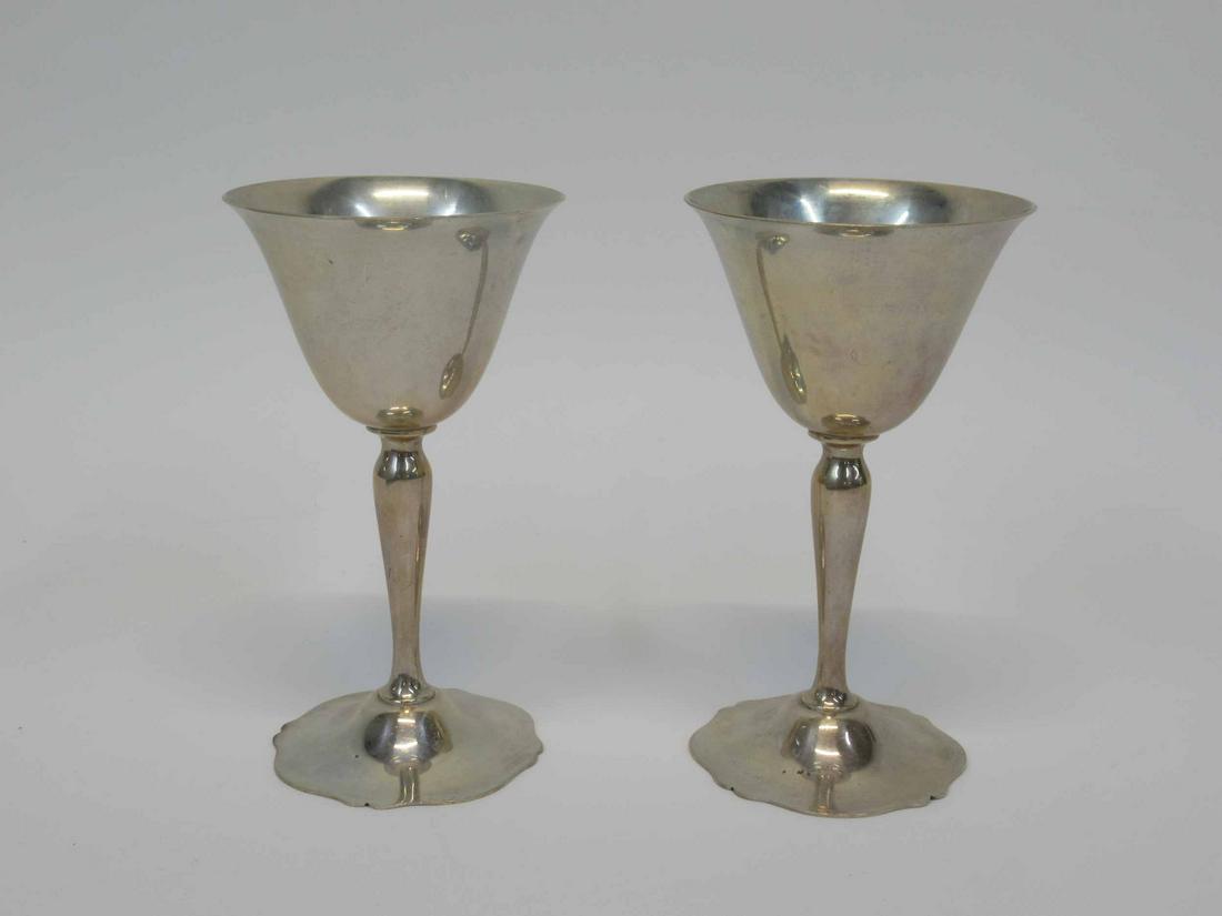 Two Wallace Sterling Silver Wine Glasses: In the "Antique" pattern. 5"h and apx. 6.5 t.o.