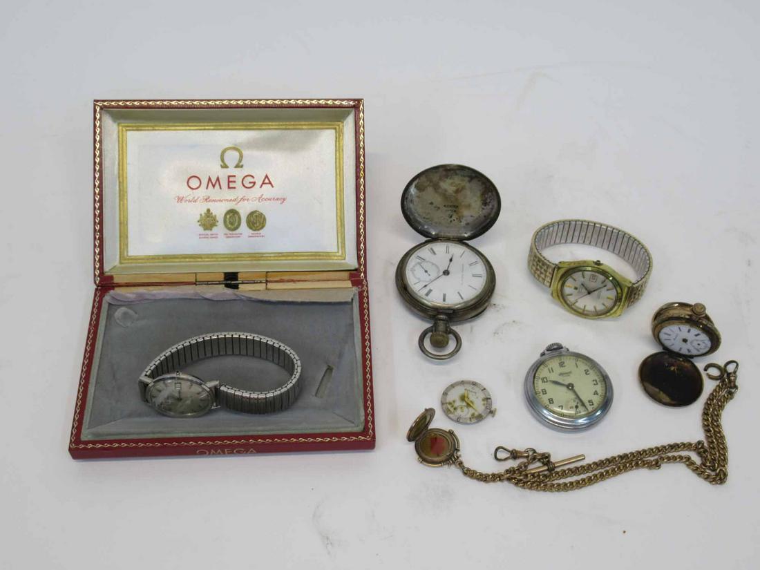 Omega Stainless Seamaster Watch: Together with a Tissot Seastar watch, three pocket watches comprising a Hampden, a Humbert and a Ingersoll Yankee, a Bulova watch face and a watch fab.Used condition, wear, worn, rust. Condition: Not