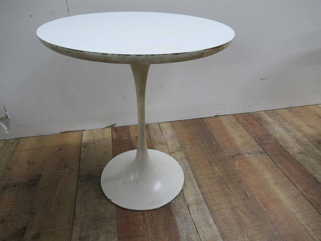 Knoll Tulip Table: Knoll Tulip Table laminate top with aluminum base, unmarked, unsigned. Used condition, wear, worn surface distress. 17 3/4" dia x 20" tall