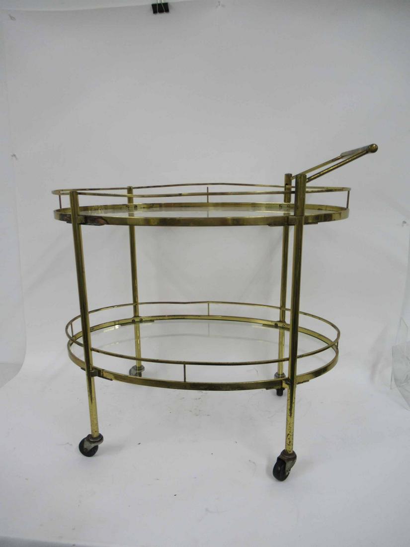 Modern Brass and Glass Bar Cart: Modern Brass and Glass Bar Cart Used Condition, Wear, pitting, surface distress. 30-1/2"h x 31"w x 18-1/2"d