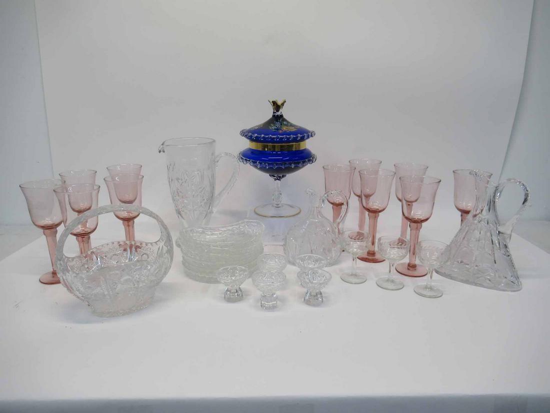 Group of Assorted Glass Table Articles: Group of Assorted Glass Table Articles comprising of pink Stemware, Ewers, Pitchers, Val St Lambert bone dishes and Cobalt compote. Used condition, some minor chips.