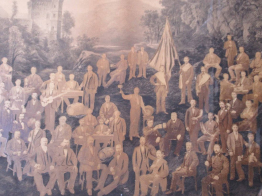 Photo Collage on a Black and White Print: Depicting a group of beer drinks and musicians, late 19th C. Tears and losses to edges. Sight size: 31-1/2"h x 43-1/2"w