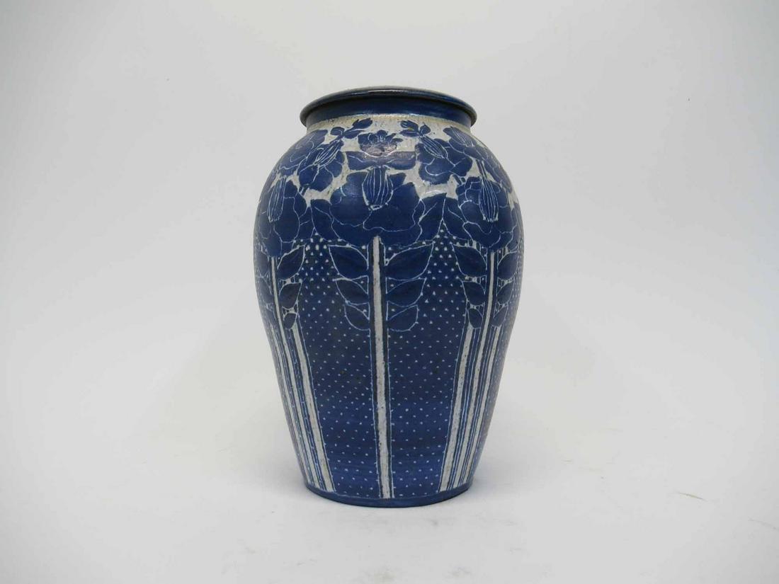 Arts and Crafts Style Blue Decorated Vase: Arts and Crafts Style Blue Decorated with Floral Design Covered Vase. Marked A M W, Used condition, small chip or repair to base. 12" tall x 8" diameter