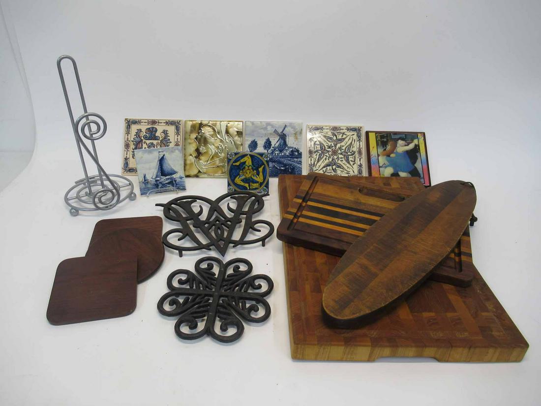 Group of Assorted Cutting Boards: Group of Assorted Cutting Boards. Together with a collection of trivets and tiles. Used condition, wear, worn.