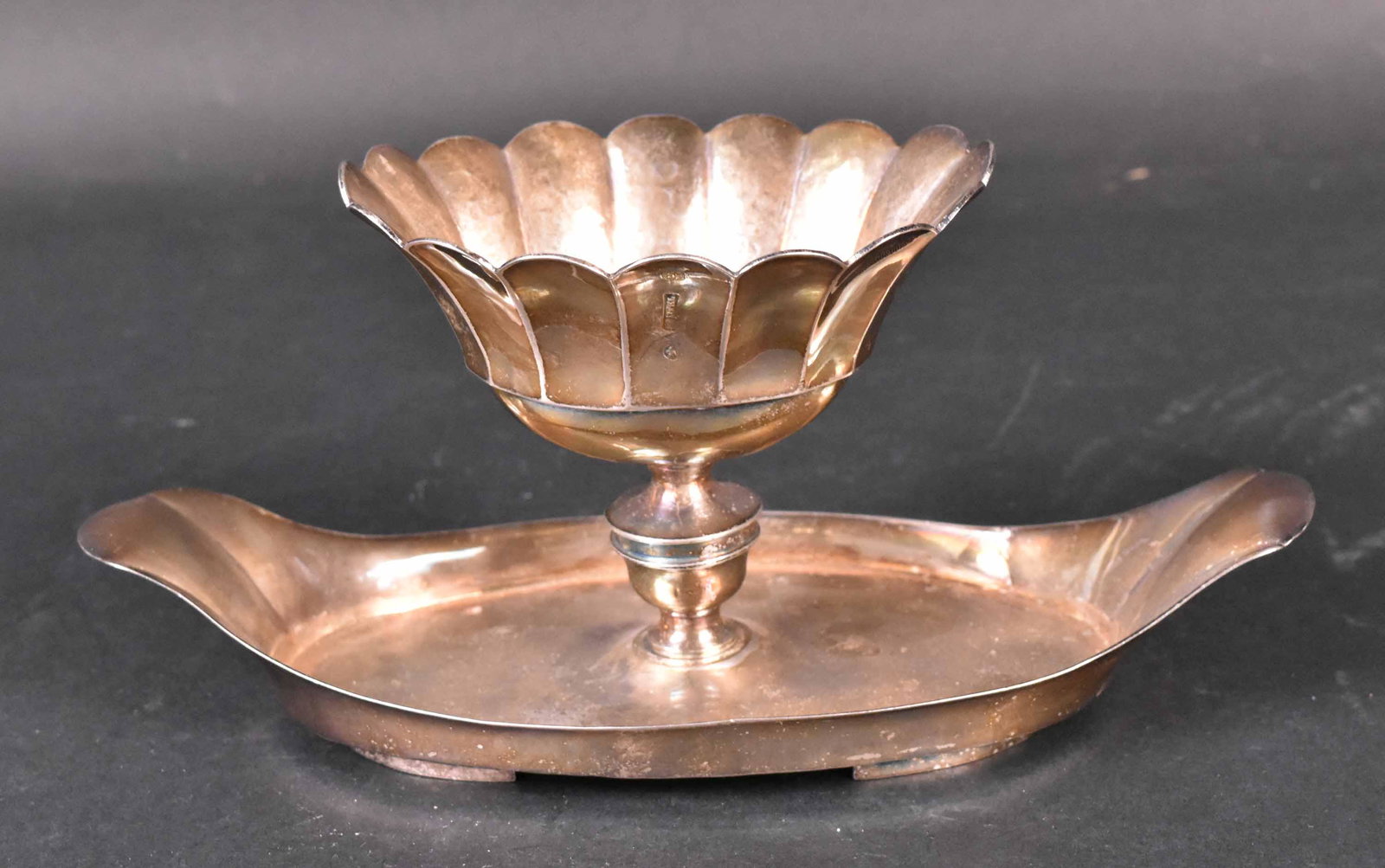 Belgian Silver Dish, Marked Anvers, 1738: With boat-form stand, the bowl of fluted oval form, 9-1/2"l, weight approx. 15 T.O. Provenance: Property from the Collection of Myrna and Bernard Posner