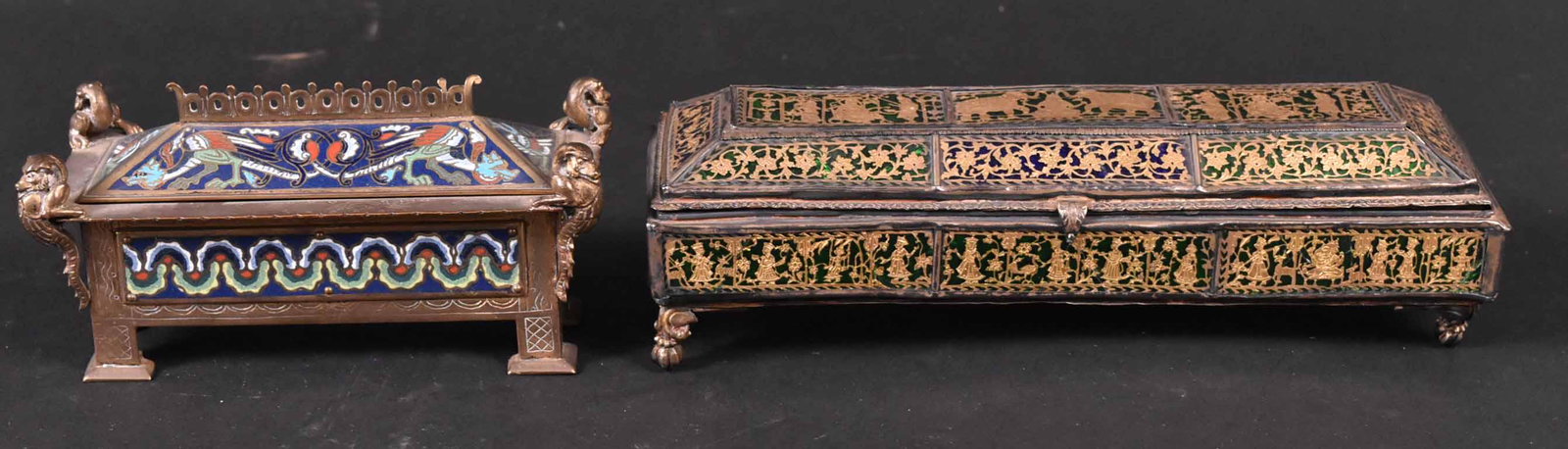 E.F Caldwell Enamel & Gilt Brass Hinged Box: Sarcophagus form, stamped on underside E.F. Caldwell, New York, three section interior, dragon motif polychrome scene, with figural animals at corners, 2-1/4"h x 5-3/4"w x 2-3/4"w. Together with an In