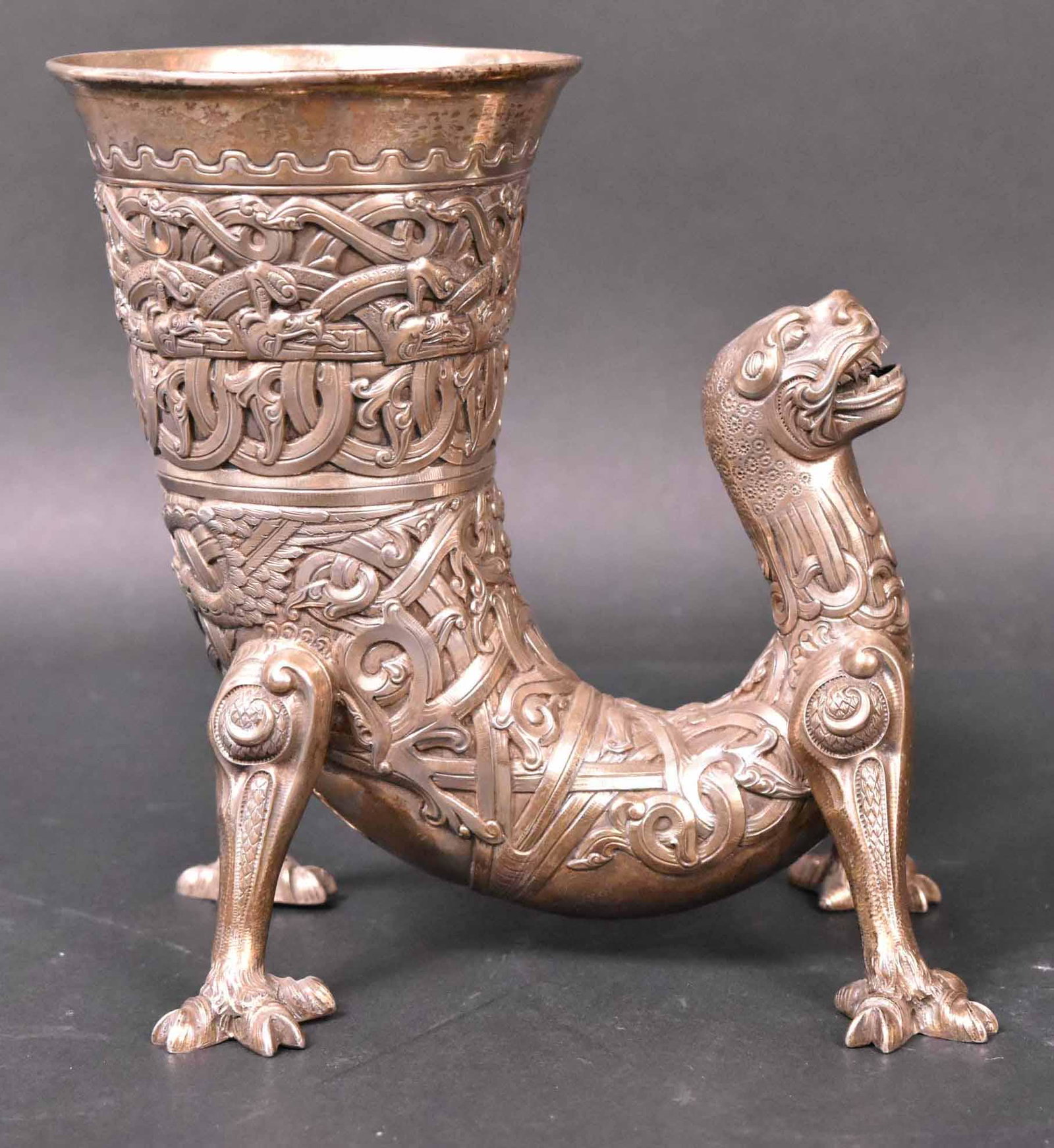 H. Moller Sterling Figural Footed Drinking Cup: Norwegian, Marked Trondheim. 6 3/4"h and 15 t.o. Provenance: Property from the Collection of Myrna and Bernard Posner