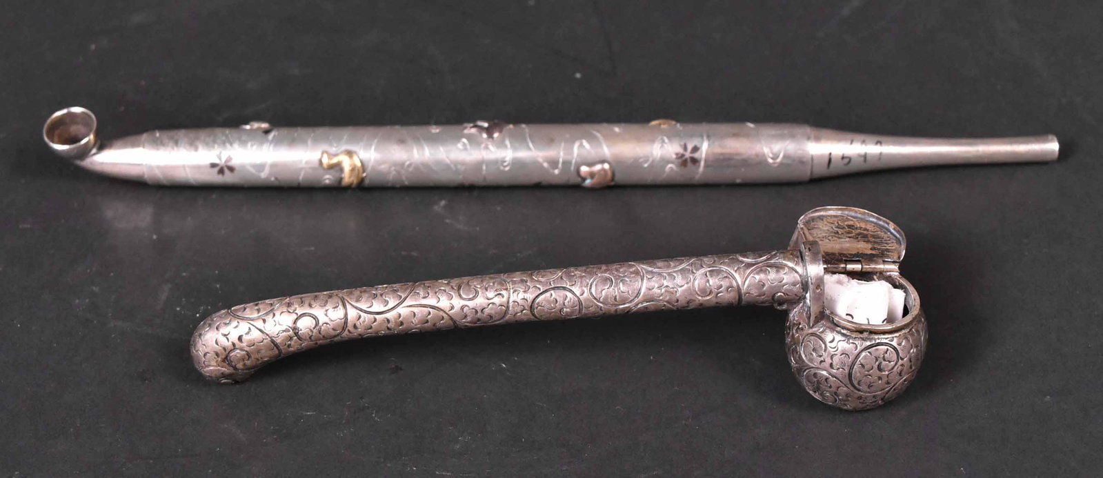 Japanese Mixed Metal Kiseru Pipe: Engraved with applied mixed metal, brass & copper ducks & birds, 10-1/4"l. Together with silvered metal pen case & inkwell, 5-1/4"l. Provenance: Property from the Collection of Myrna and Bernard Posne