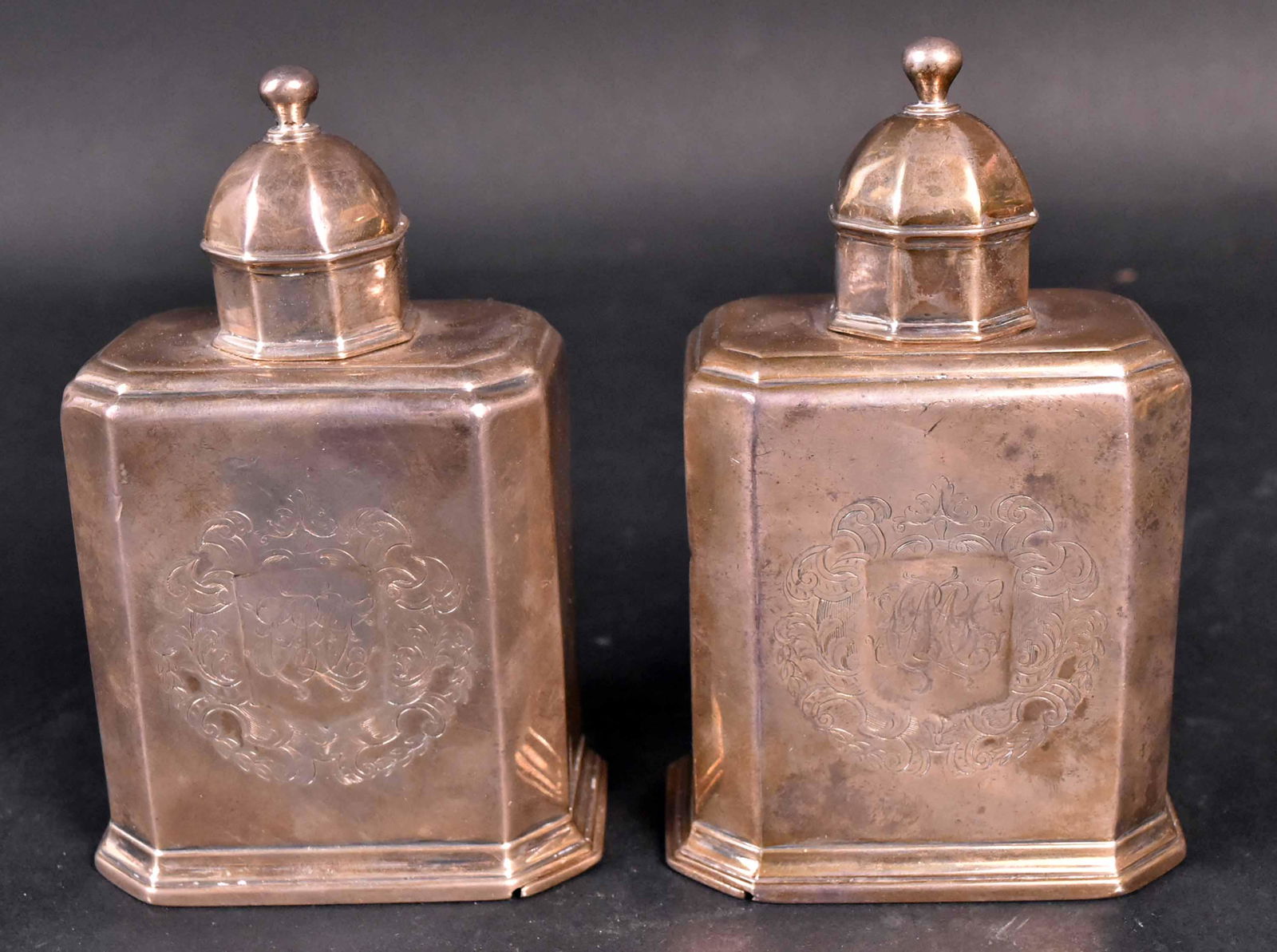 Pair of George I Silver Tea Caddies, John Farrell: London, 1724, with later rooster crest, monogram and crest to reverse, each 5-1/4"h, weight approx. 15 T.O. Provenance: Property from the Collection of Myrna and Bernard Posner