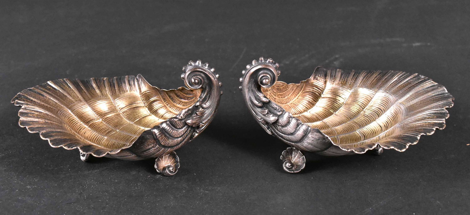Pair of Posen 800 Silver Master Salts: The footed seashell form salts have gilt interiors and are stamped "L. Posen and 800". (German, Lazarus Posen) 3"h x 5"l and apx. 5 t.o.