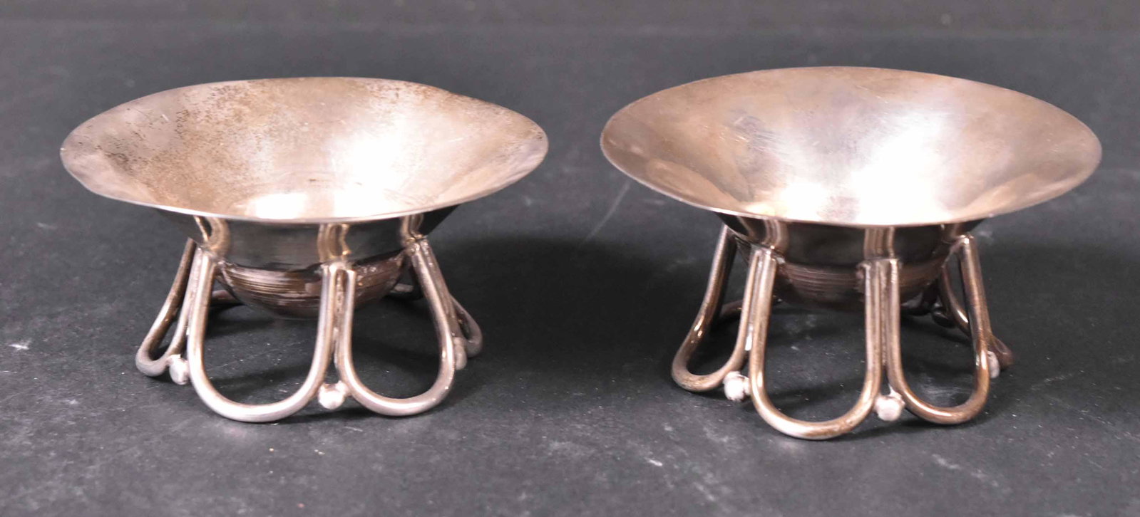 Pair of Spratling Mexican Footed Dishes: Sterling. 2"h x 3"dia/ and apx. 6 t.o. Provenance: Property from the Collection of Myrna and Bernard Posner