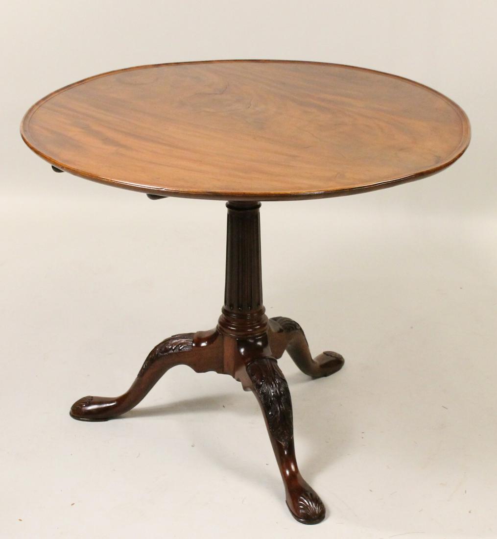 George III Mahogany Dish-Top Tripod Tea Table: Irish, c. 1760. Cracks and slight warping to top. 27-1/4"h x 33-3/4"dia.
