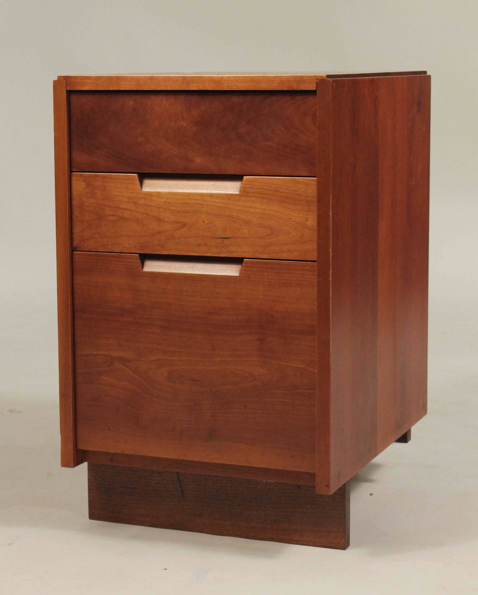 George Nakashima Cherrywood Petite Commode: (1905-1990) Nakashima Studio, with copy of original receipt. 25-1/2"h x 19-1/2"w x 15-1/2"d Provenance: The Collection of the Estate of Elayne and Monroe Weinstein, Poughkeepsie, NY.