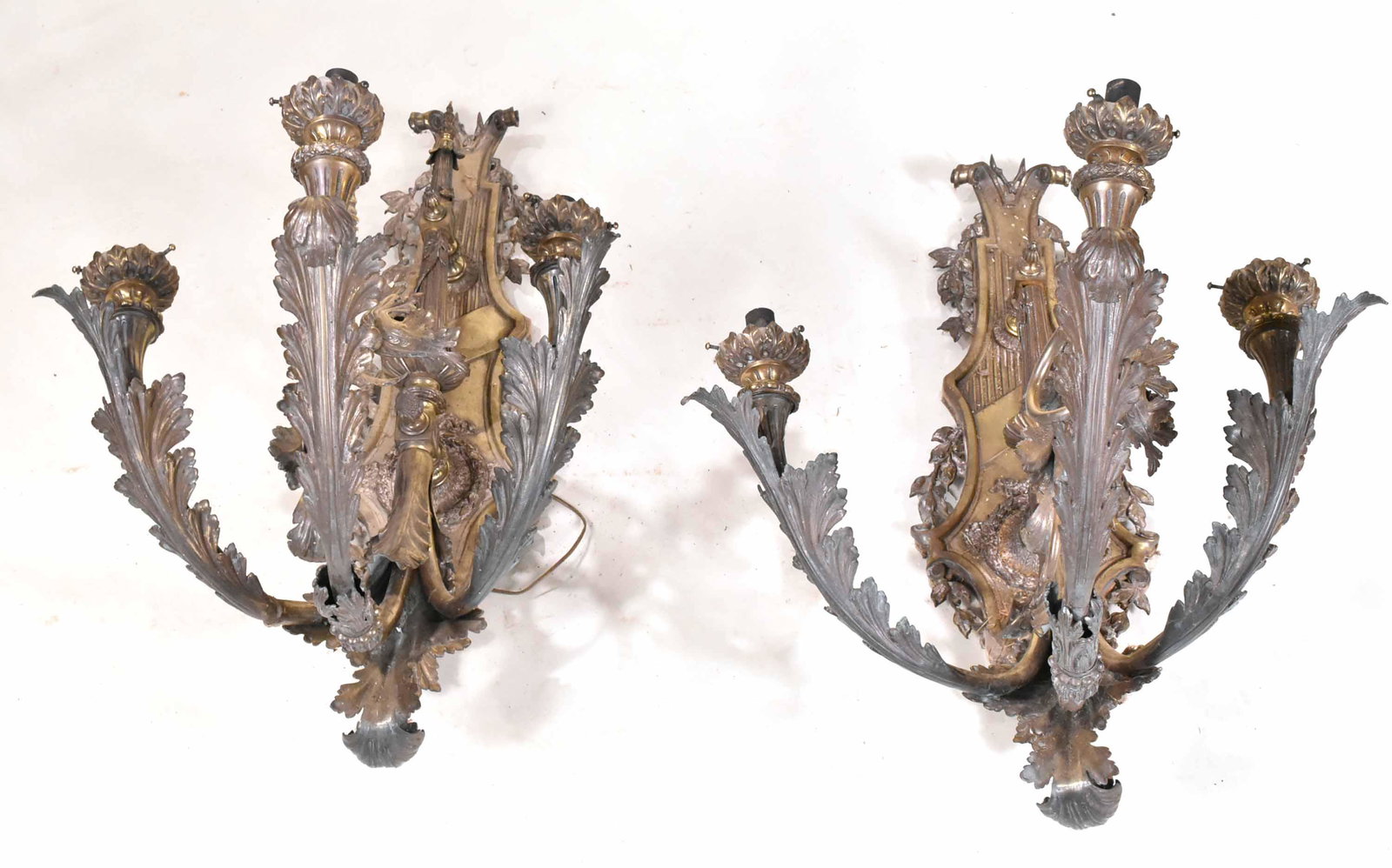 Pair of Gilt-Metal Three-Light Wall Sconces: 19th/20th C. of impressive size. 45"h x 24-1/2"w x 32"d Provenance: Property from an Ohio Estate.