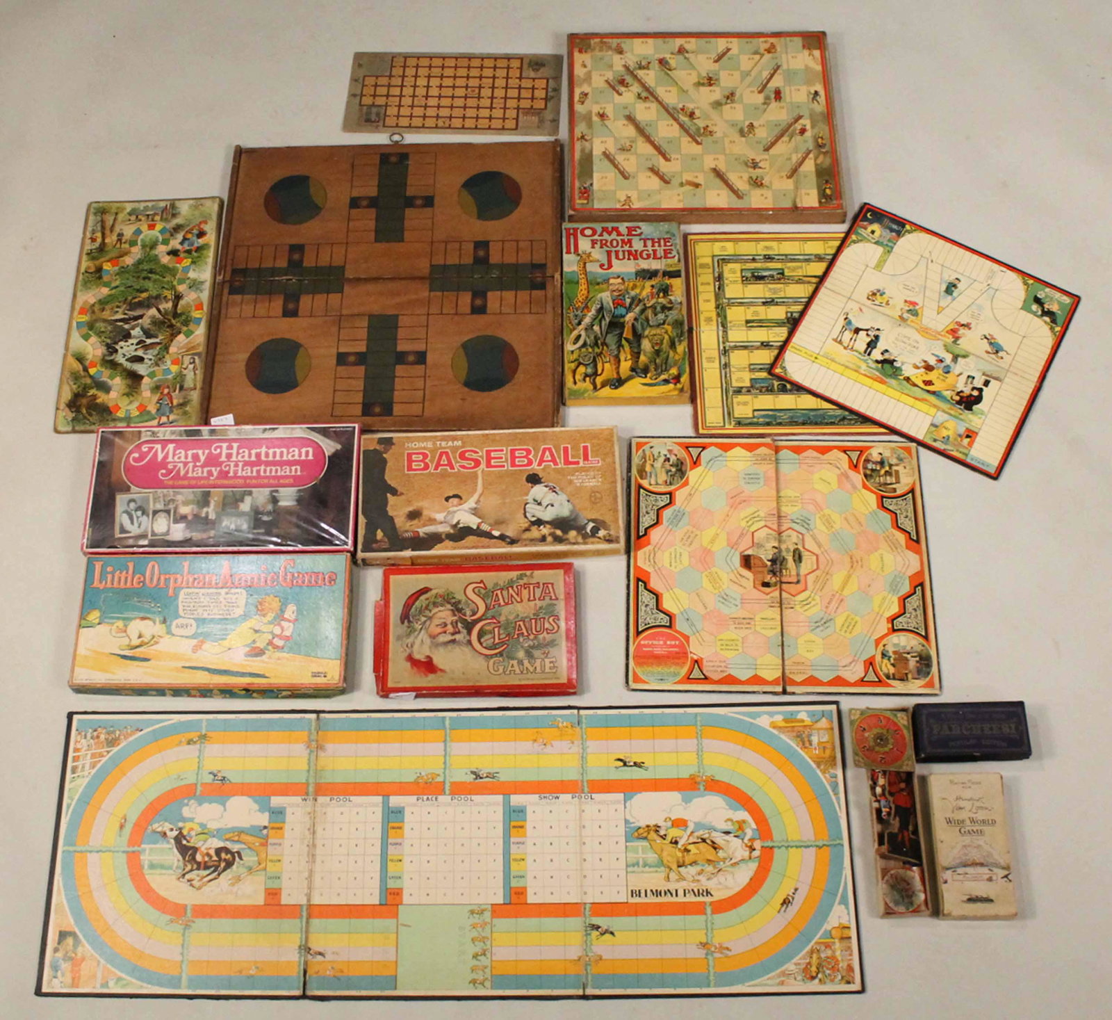 Group of Vintage Board Games and Boards: Including Little Orphan Annie Game, Home Team Baseball, Milton Bradley Santa Claus Game, Mary Hartman Mary Hartman The Game of Life, Parker Brothers Wide World Game, A Royal Game of India Parcheesi an