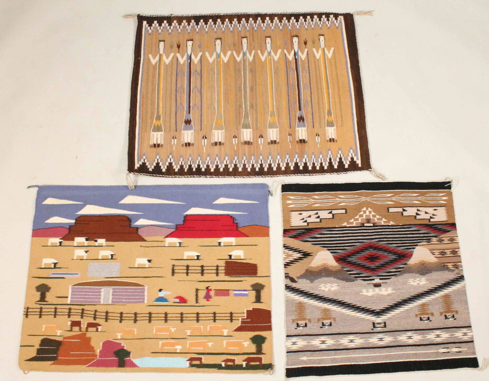 Three Southwestern Throw Rugs: With figural and landscape scenes.